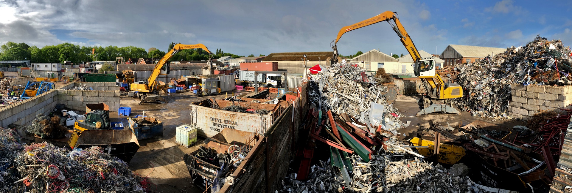 Metal Recycling Facility with machinery processing ferrous and non ferrous metals